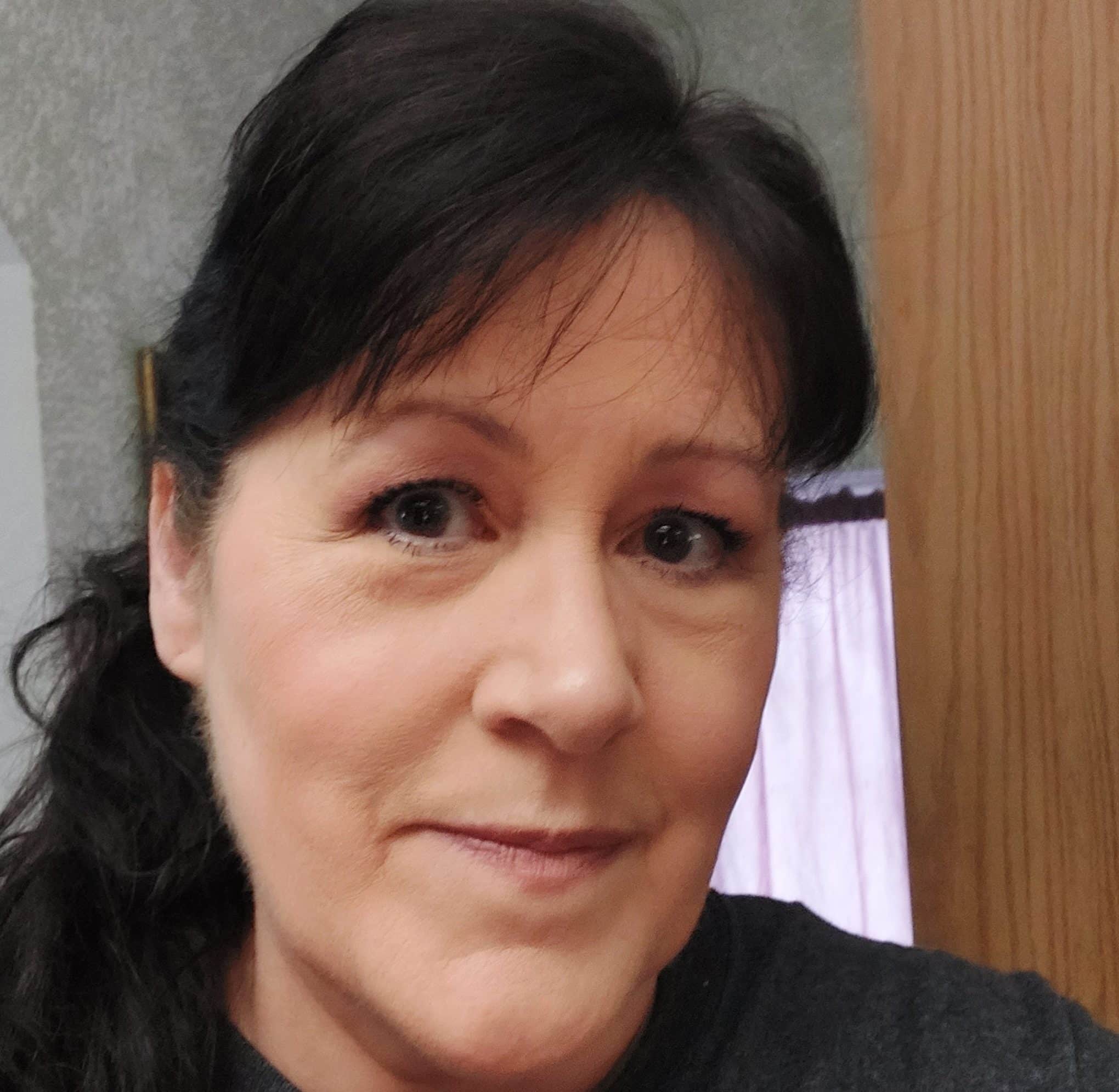 a woman taking a selfie